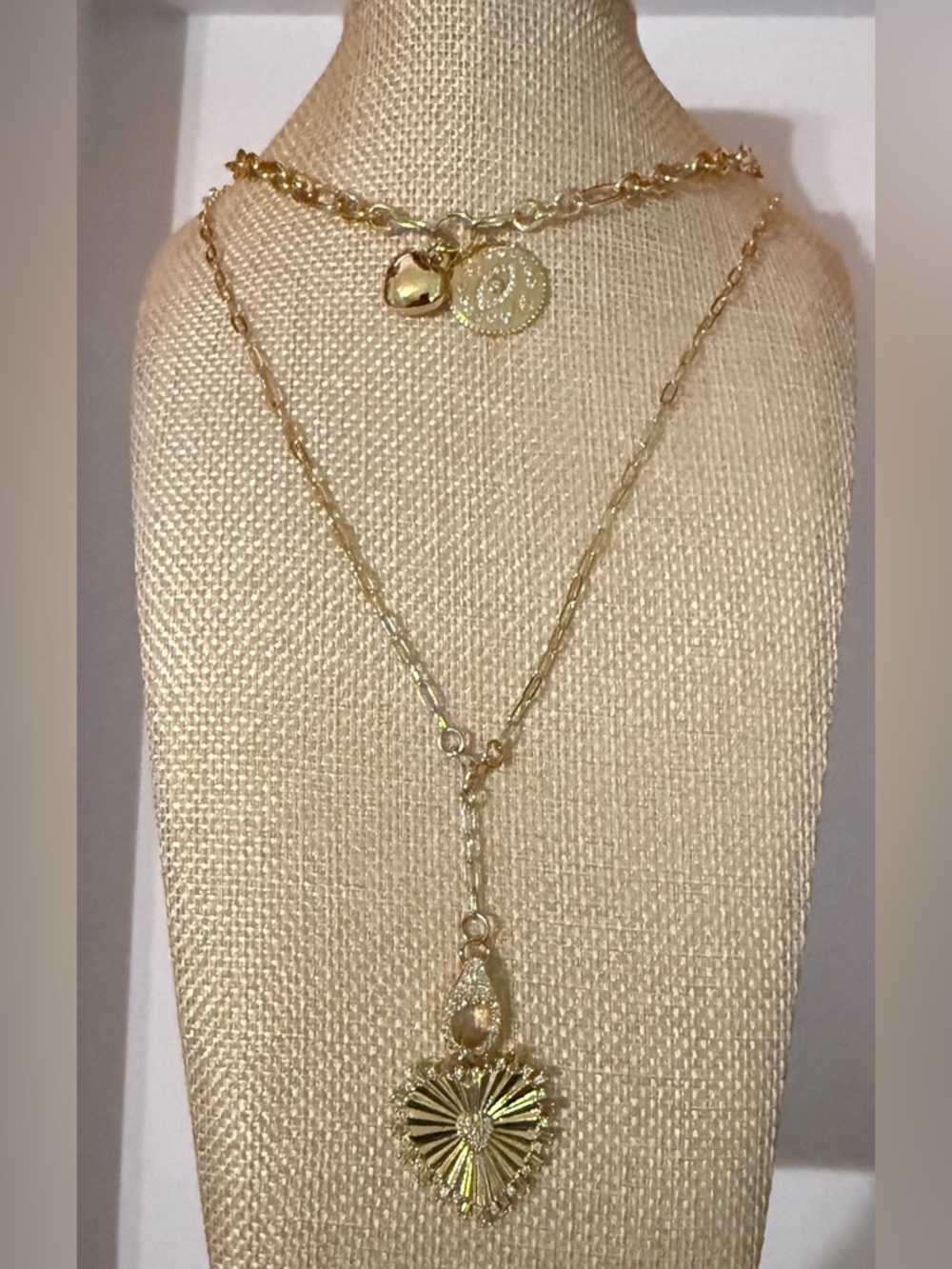 Gold Tone Layered Necklace Set featuring stones, hearts and evil eye